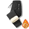 Pantalones de lana de cordero para hombre, pantalones cálidos de invierno con forro polar engrosado, pantalones casuales de talla grande, pantalones casuales de algodón a prueba de viento para exteriores para el Noreste