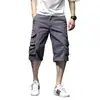 Punto al por mayor overol suelto para hombre multibolsillos pantalones cropped lavados para exteriores talla grande pantalones sueltos de 7 puntos