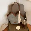 Bolsa Tote de Ombro Único/Axila Moda Versátil de Alto Padrão Estilo Novo de Verão 2026 Design Exclusivo de Nicho para o Dia a Dia Transfronteiriça