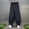 Calças casuais masculinas de secagem rápida para atividades ao ar livre, calças retas de outono, novas calças masculinas 2026, calças esportivas leves com blocos de cor amassadas