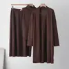 Conjunto casual de punto transfronterizo para mujer, nuevo estilo otoño e invierno, chaqueta de corte holgado, chaleco y falda conjunto de tres piezas