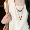 Collar con Colgante Redondo de Corazón con Cuentas de Madera de Cáscara de Coco Cadena para Clavícula Estilo Étnico Retro Cadena para Suéter Diseño de Nicho