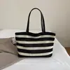 Bolso de Mano Rayado Simple de Primavera 2026 Bolso de Hombro de Gran Capacidad Bolso Tote de Moda Bolso de Playa Hueco para Mujer