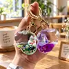 Colgante acrílico relleno de aceite con arena movediza, nube de sirena, llavero lindo, accesorio para mochila de estudiante, pequeño regalo exquisito