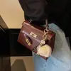 Bolso de mujer personalizado, bolso de hombro versátil para mujer con estampado de piedra, nuevo bolso de mano de moda de invierno, bolso Kelly retro a la moda
