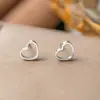 Aretes de acero de titanio aretes de alta gama nicho temperamento Perla aretes de borla de flor encantadores joyería versátil para mujer venta al por mayor