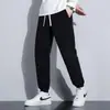 Pantalones deportivos para hombre, pantalones casuales de pana con retazos para primavera y otoño, corte holgado, versátiles, pantalones jogger de moda