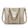 2023 nuevo bolso de moda europeo y americano para mujer bolso tote de cuero encerado de moda bolso de hombro simple para mujer una generación de pelo