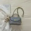 Bolso pequeño muy elegante y único para mujer, nuevo bolso de hombro y cruzado de moda retro de nicho para el verano de 2026