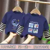 Camiseta de manga larga de algodón puro con retazos para niños, nuevo estilo primavera/otoño, diseño de dibujos animados, casual y versátil, parece un conjunto de dos piezas, moderno