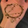 Pulsera multicapa de estilo exótico para niña 2025 nueva sensación genial alta antigua única joyería al por mayor