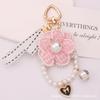 Nuevo Llavero Colgante de Cinta de Camelia Perla Adorable Flor de Tela de Color Accesorios Decoración de Bolsa para Audífonos