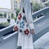 2020 nuevo bolso de lana Dongdaemun estilo universitario simple con flores tejidas bolso lindo para niña