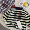 Camisa Polo Infantil 2026 Producto Nuevo de Otoño: Camiseta de Rayas para Niños y Niñas Jóvenes, Camiseta Base con Estampado de Oso de Moda, Moderna