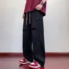 Jeans plisados de moda para hombre, pantalones casuales versátiles de pierna recta holgada con cordón para primavera y otoño, para adolescentes