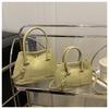 2025 Versión Coreana Nuevo Bolso de Cubo de Mano Casual Simple para Viajar Textura Color Sólido Bolso de Mano de Axila Bolso Cruzado para Mujeres