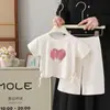 Conjunto Infantil para Niña de Manga Corta con Estampado de Corazón de Semicírculo Colección Verano 2026 Nuevo Conjunto de Dos Piezas: Top y Pantalón Largo para Niña