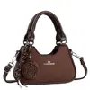 Bolso de mujer, nuevo y elegante bolso tipo albóndiga, bolso de mano, versión coreana, bolso de hombro, bolso cruzado para mujer