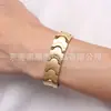 Pulsera de Acero de Titanio Simple de Moda Popular en Europa y América Pulsera Magnética Ondulada de Acero Inoxidable Pulsera de Energía Aniónica