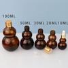 Botella de calabaza doble marrón de 10 ml estrictamente seleccionada en stock, botella de aceite esencial, botella de vidrio a prueba de luz, subbotella cosmética, botella con bola rodante