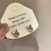 Pendientes de botón de mini lazo exquisitos de celebridad de internet Pendientes franceses pequeños súper brillantes Pendientes versátiles de temperamento dulce para mujeres venta al por mayor