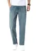 Jeans cortos ultra delgados de Tencel para hombre, nuevo estilo de otoño, Guangzhou Xintang corte recto holgado, pantalones de 9 puntos elásticos de seda helada