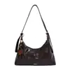 Bolso tote casual y elegante de cuero encerado para mujer, nuevo modelo 2026, gran capacidad, adecuado para ir al trabajo, bolso de hombro de moda con un look sofisticado