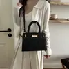 Nova bolsa de ombro da moda, bolsa de mão feminina simples e versátil, bolsa transversal Kelly nichada e única