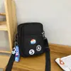 Bolso Cruzado Simple para Pareja 2024 Nuevo Estilo Estilo Utilitario Bolso Cuadrado Pequeño Marca de Moda Estilo Hong Kong Bolso Cruzado Bolso para Teléfono Móvil y Monedas