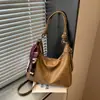 Bolsa de Bolinho Casual Moda Transfronteiriça Grande Capacidade Outono 2026 Nova Bolsa de Ombro Transversal Bolsa de Axila Retro para o Trabalho