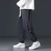 Calças casuais de veludo cotelê para outono para homens, novas calças jogger de retalhos de chenille com corte solto, calças de moletom esportivas de marca da moda
