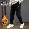 Directo del fabricante: Pantalones casuales forrados de polar para hombre, modernos, duraderos, de corte holgado tipo jogger, pants deportivos, venta al por mayor para invierno