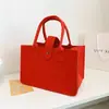 Bolsa de Fieltro de Color Sólido Directo de Fábrica Bolsa de Regalo Gran Capacidad Bolsa de Regalo Se Puede Imprimir LOGOTIPO En Stock