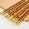 Vendedor Popular de Comercio Electrónico Palillos de Bambú Comerciales Antideslizantes para el Hogar Bambú Nano Madera de Ala de Pollo con Veta Redondos Fu Vajilla Palillos al por Mayor