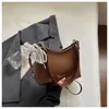 Bolsa balde estilosa e da moda para mulheres, bolsa de mão, nova bolsa estilosa de 2026 com textura tecida, ombro único, versátil para o trabalho e transversal.