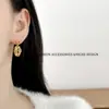 Pendientes de botón ovalados con incrustaciones de circonita bañados en oro estilo vintage, pendientes de perla con elegancia francesa, pendientes versátiles de lujo de alta gama