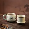 Taza de Oficina de Apsaras Voladoras de Dunhuang Taza de Cerámica Ru Kiln con Tapa Separación de Agua y Té Taza con Infusor de Té Taza de Gama Alta Souvenir