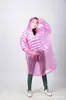A008 material nuevo paquete grande cuatro botones impermeable PE adulto exterior engrosado impermeable de una pieza venta al por mayor