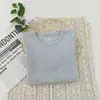 Camiseta interior para niños Estilo Otoño 2025 Color Sólido Cuello Redondo Camiseta interior para Niños y Niñas, Modelo Básico Versátil para Niños
