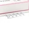 Brincos Redondos de Diamante Branco de Quatro Garras Populares Transfronteiriços Moda Ins Brincos Geométricos Versáteis Brincos de Aço Inoxidável para Mulheres