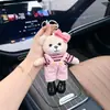 Colgante de Oso de Peluche con Lazo y Piernas Largas, Mono con Camiseta Rayada, Llavero de Oso de Piernas Largas, Encanto para Bolso para Mujeres