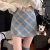 Falda de lana a cuadros para mujer, nuevo estilo otoño/invierno, retro y elegante, de cintura alta, falda de línea A adelgazante, falda ajustada, falda corta a cuadros