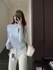 El atuendo perfecto para otoño e invierno: una camiseta de manga larga lisa, cómoda, cálida y adelgazante, con cuello redondo, perfecta para usar en capas