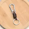 Fabricante Llavero Tejido a Mano Accesorios Hebilla de Escalada Retro Versátil Cuerda de Cuero 25mm Anillo de Llave Colgante DIY