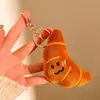 Pequeños regalos actividades de catering para promocionar el puesto muñeco de peluche lindo muñeco colgante decoración de mochila llavero