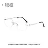 Gafas para miopía con lentes fotocromáticos, bloqueo de luz azul y un diseño sin montura ultraligero, aptas para hombres y mujeres.. Estas gafas fotocromáticas son exclusivamente para ventas transfronterizas.