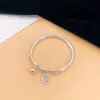 Pulsera de la Fortuna para Mujer con Carácter de Bendición y Colgante de Cascabel, Nuevo Diseño Nicho Estilo Chino, Pulsera Versátil de Empuje y Tirón Chapada en Plata