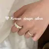 Popular Joyería Brillante de Plata de Nicho de Dongdaemun, Corea del Sur: Anillo de Plata de Ley S925 Retorcido con Perla Natural, Versátil y Sencillo