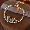 Pulsera de Mariposa con Diamantes y Perlas Chapada en Oro Real para Mujer Retro Francés Lujo Accesible Pulsera Versátil de Gama Alta Exquisita Joyería de Mano
