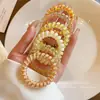 Anillo para el cabello con línea telefónica sin costuras de gelatina, duradero, con resorte, para verano, nuevo, fresco, combina con todo, con cola de caballo, cuerda para el cabello
